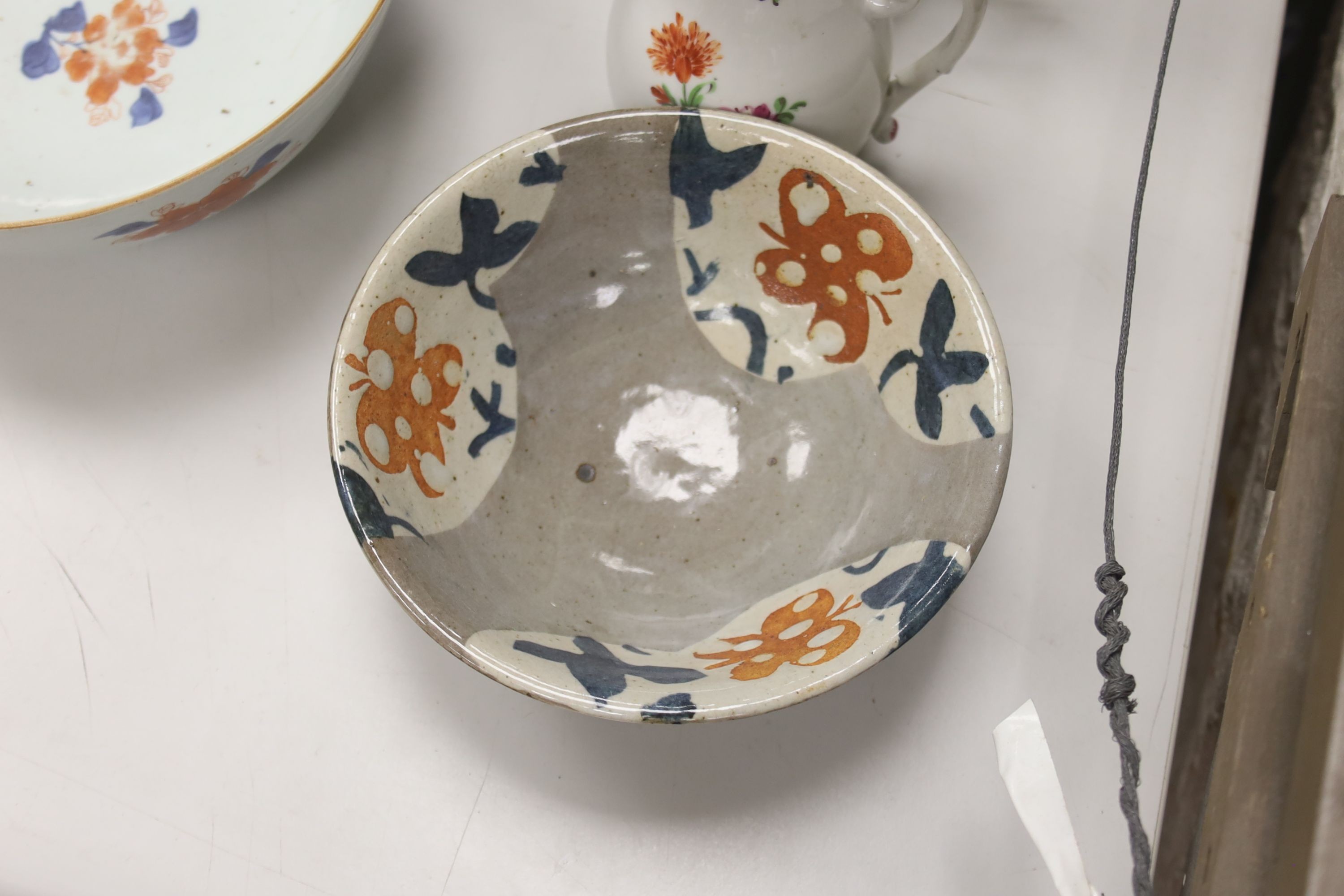 Sundry ceramics, including a studio pottery bowl, a Chinese export porcelain lidded coffee pot, a German porcelain lidded jug (a.f.), a Japanese blue and white dish, etc.